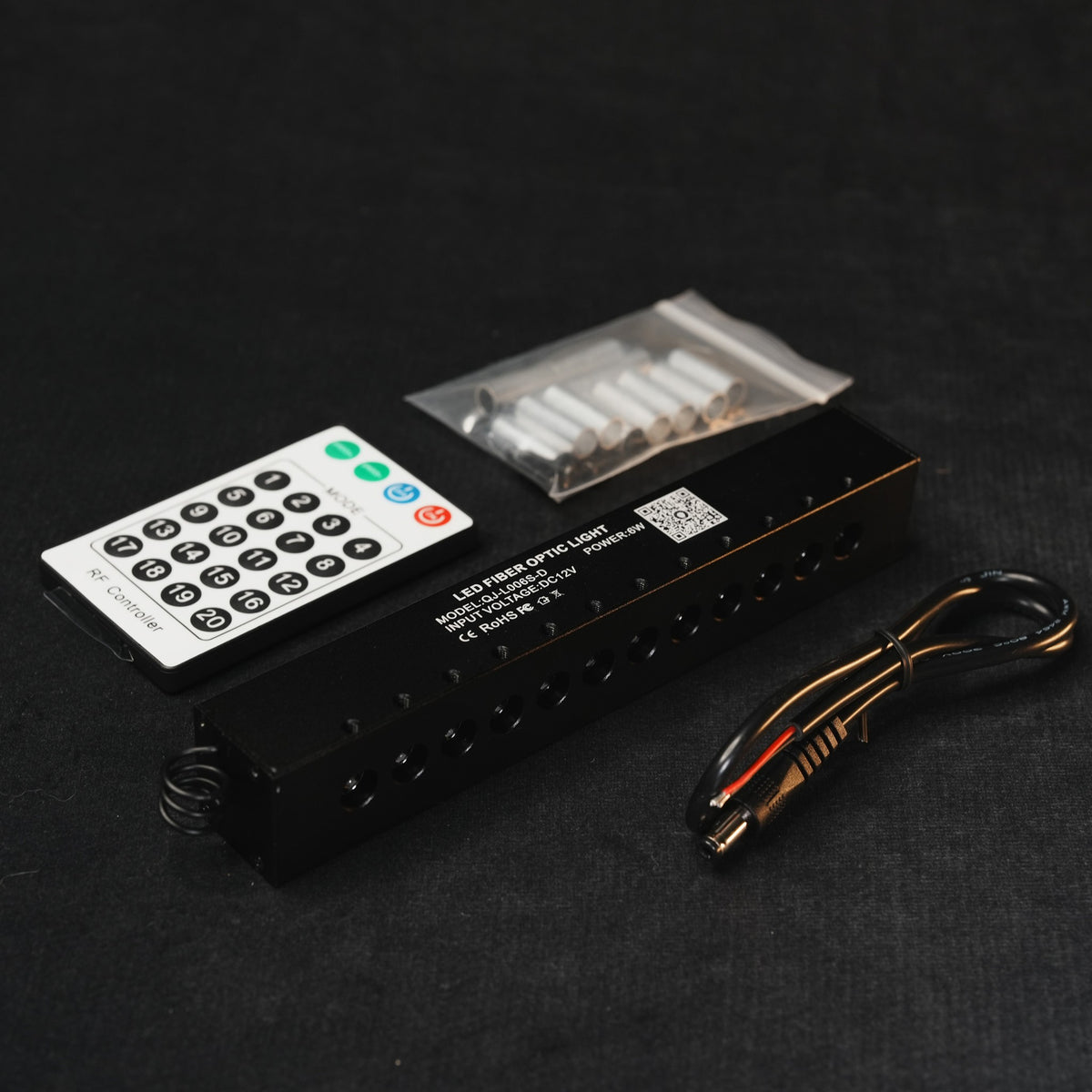 STARLIGHT Shooting Star Kit contents by dubhaus, projector module, RF remote, wiring harness and fittings
