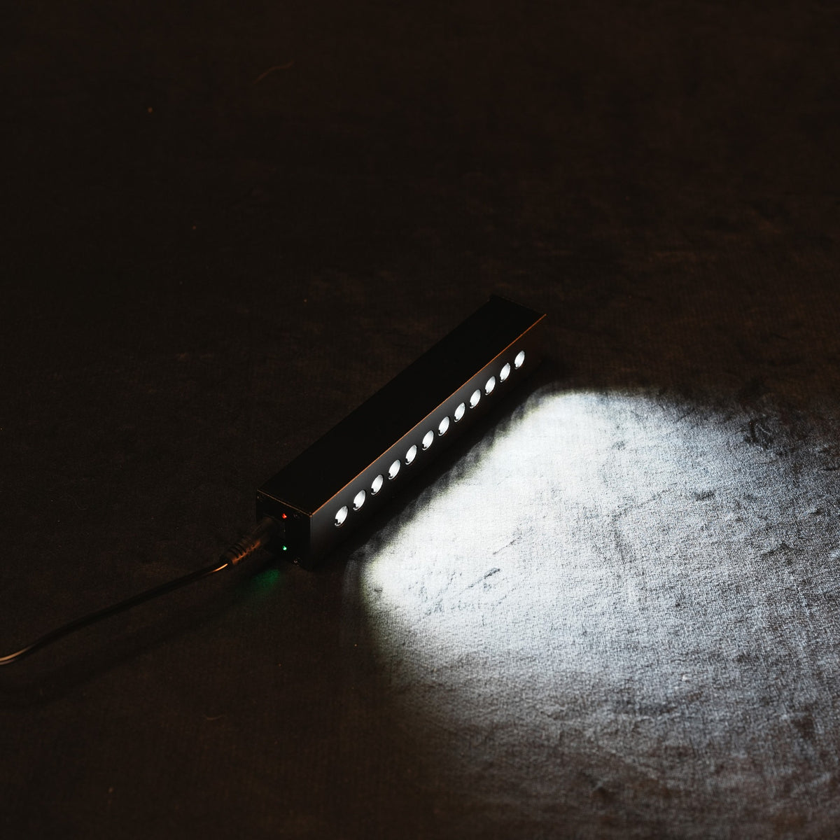 STARLIGHT Shooting Star Kit by dubhaus switched on, showing the light output from the projector